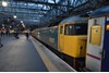 Large logo blue 47847 stands at Glasgow Central on January 19, with the 2350 from London Euston. Paired with 47812, the '47/8' hauled Caledonian Sleeper's train via Dumfries, replacing 90048 at Carlisle. RICHARD CLINNICK.