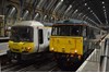 Govia Thameslink Railway 365523 is a more common visitor to London King's Cross on January 18, as Caledonian Sleeper 86401 Mons Meg stands under the train shed having hauled empty coaching stock from Wembley ready for that night's 2106 to Aberdeen/Fort William/Inverness. RICHARD CLINNICK.