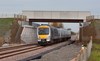 Chiltern Railways 168215 passes Oddington, with the 1235 London Marylebone-Oxford Parkway on October 25.
