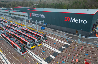 Tram-trains stand outside Taffs Well depot in January 2024.