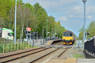 London Northwestern Railway 150159 approaches Stewartby with the 1347 Bedford-Bletchley on April 16. It's about to cross the level crossing between the two staggered platforms. CHRIS HOWE.