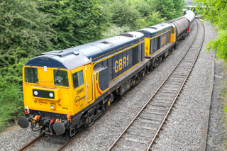 Rounding the curve at Castle Gresley on the Coalville - Burton section of the line, GBRf Class 20s 20905 and 20901 form the tail pair working the 11:47 Old Dalby - West Ruislip LUL underground stock move on July 1 2015. 