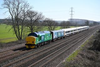 EPR 37218 in its HVO green livery hauls former Southeastern 466001 and 465920 passed Loughborough South Junction on March 18, taking them from Ely Papworth Sidings to Kingsbury Emr Sidings. DARREN WETHERALL. 