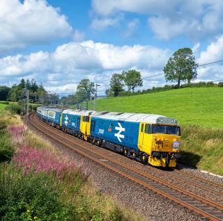 50007 and 50048 pass Lambrigg on August 24 with the Taunton to Aberdeen railtour. TOM MCATEE