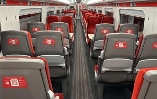 QR code stickers on the seatbacks of an LNER service… and on an information screen at King‘s Cross. WHOOSH