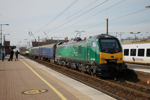 Rail Operations Group 93008 and 93009 pass Wigan North Western on March 19, with two barrier coaches en route from Mossend to Derby.  PAUL SENIOR.