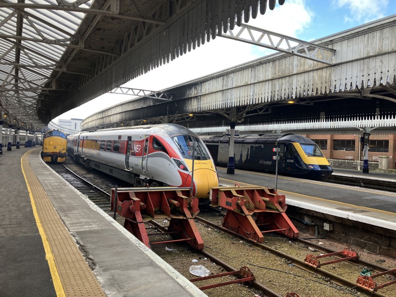 LNER Azuma 800104 and ScotRail Inter7City HST 43145 stand in Aberdeen station. CONRAD LANDIN.