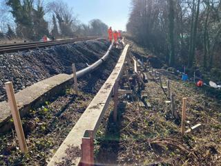 Network Rail is focusing more on maintenance rather than renewals, with the effects of severe weather becoming an increasing problem. In January, NR engineers work to repair a landslip at Tinsley Green on the Brighton Main Line. NETWORK RAIL.