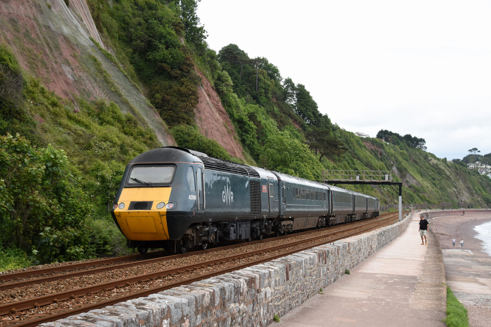 Great Western Railway 43098 is seen at the rear of the 1039 Penzance-Exeter St Davids at Sprey Point between Teignmouth and Parsons Tunnel on May 31 2025. DAVID HUNT.