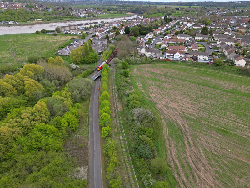 DB cargo 66655 with a Margam to Portbury empty steel train passing the junction to Portishead, on the edge of Pill village. GARY ESSEX.