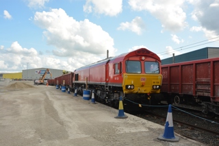 DB Cargo UK 66139 shunts wagons at Cemex's Dallam Freight Depot, Warrington. DAVID STUBBINGS.