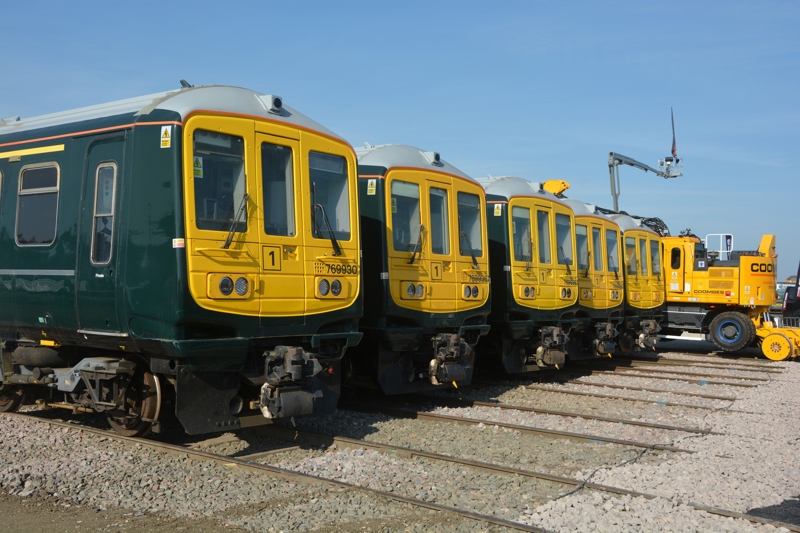 Off-lease Class 769s parked up at Porterbrook's Long Marston site. DAVID STUBBINGS.