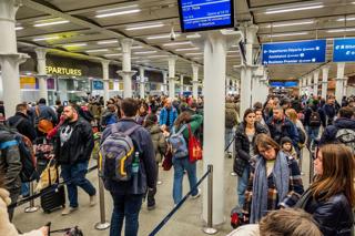 Passengers queue for Eurostar services at St Pancras International in December 2023.With passenger numbers to European destinations expected to grow, HS1 Ltd has commissioned a study into how to increase passenger capacity at the station. ALAMY.