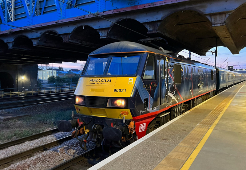 90021, hauling the 1610 Deepcar-Finsbury Park ‘Last Chance’ charter (which it worked from Doncaster RMT), stands at Peterborough on April 8 2023. The ‘90’ has been acquired by Freightliner from DB Cargo. PIP DUNN.
