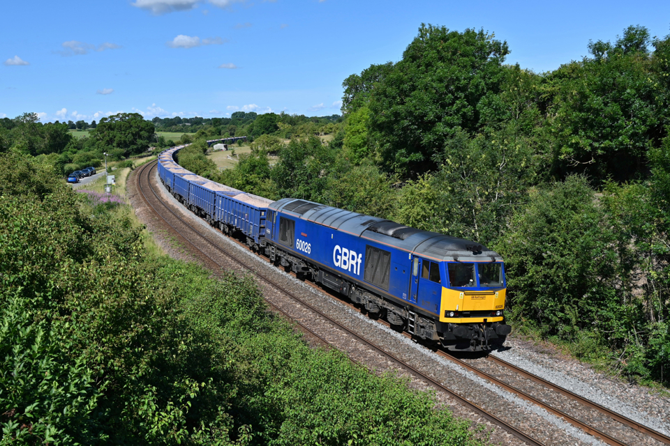 60026 is seen curving around the line towards Crofton Beam Engines (Bedwyn), at the helm of the 0704 and-tailed new Piccadilly Line Tytherington-Quainton Railhead aggregates train. JOSH MASON.