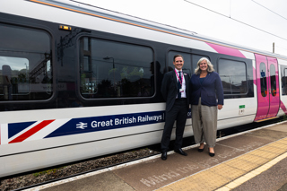 c2c Managing Director Rob Mullen with Transport Secretary Heidi Alexander. DEPARTMENT FOR TRANSPORT.
