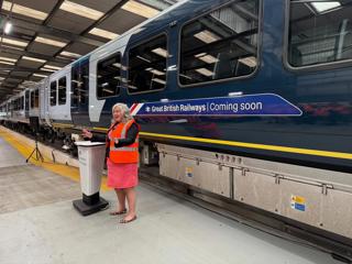 Transport Secretary Heidi Alexander unveils the new “GBR - Coming Soon” logo at SWR’s Bournemouth Depot on May 22. PAUL CLIFTON.
