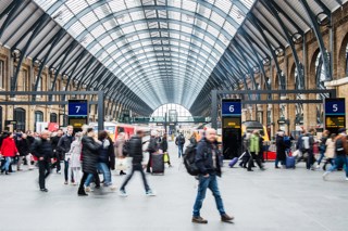 Passengers at London King's Cross. JACK BOSKETT.