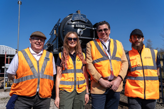 Rob Morland (A1 Steam Trust), Amy Clouston (AtkinsRealis), Ben Mason (ECDP), Raymond Sturton (Hitachi), in front of 60163 Tornado. NETWORK RAIL.