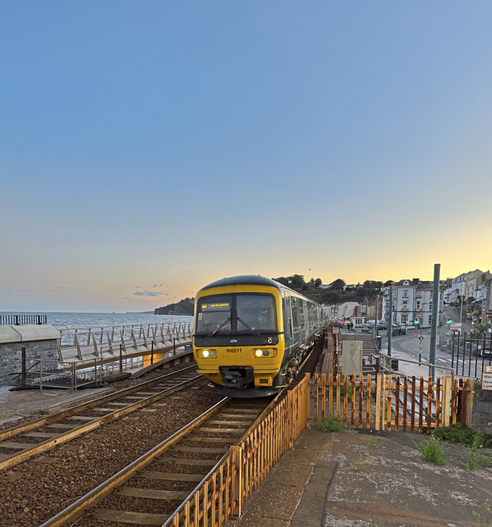 Great Western Railway 166211 arrives at Dawlish. 