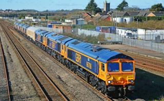 GBRf 66708 Jayne hauls 66777/776/779/778/773/774/775 through Severn Beach, with the 1045 Newport Docks-Doncaster Roberts Road, the very last new Class 66 convoy. MARK PIKE.