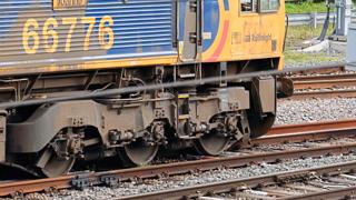 Derailed freight train
