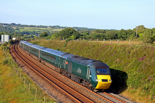 GWR 'Castle' Class 255 HST set with 43192 'Trematon Castle' and 43198  passes Scorrier near Redruth on 20.6.22 with 2C79 1401 Cardiff Central to Penzance service. PAUL BIGGS.