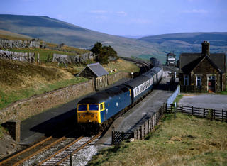 With the the threat of closure still in the air, 47531 passes a then-closed Dent station with the 1600 Leeds to Carlisle train on May 12 1984. 