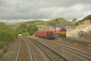 The view of Cemex’s Peak Forest terminal from the cab of 66139 as we approach the summit of the climb from Peak Forest Long Sidings. DAVID STUBBINGS.