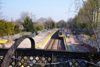 A CrossCountry services passes through as construction of the new Pineapple Road station continues. PETER PLISNER.