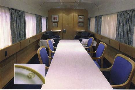 The Royal Dining car can accommodate 14 guests for dinner. Catering is provided from an adjacent kitchen. On very special occasions, the 1902 LNWR dinner service (inset) is used, providing a remarkable link with other Royal Trains built and maintained at Wolverton. RAIL.
