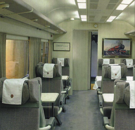 The Household Dining car is similar to standard Mk 3 First Open coaches, with Pullman seats. All seats have Royal Train antimacassars. RAIL