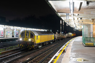 TfL L45 in its yellow livery heads the 2335 Ruislip Depot-Walthamstow Central engineering train through Chiswick Park on February 11. JASON CROSS.