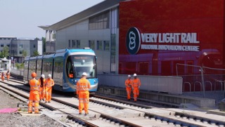 West Midlands Metro Tram 44 passes the Very Light Rail National Innovation Centre during testing of the Dudley extension. PETER PLISNER.