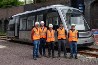 The Universal Signalling team with the team with the Coventry VLR vehicle. UNIVERSAL SIGNALLING.