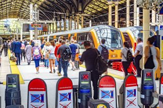 Passengers boarding train at London Liverpool Street station. Matthew Ashmore / Alamy Stock Photo